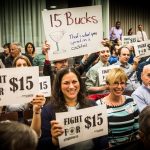JUFJ members advocating $15 minimum wage