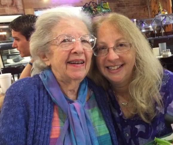two people posing together for a photo