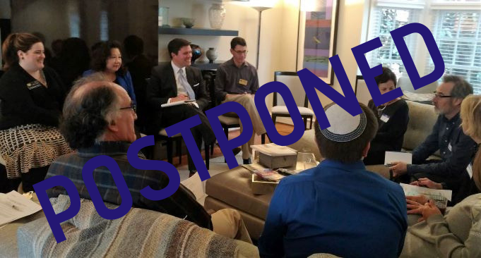 photo of a meeting with text superimposed reading POSTPONED