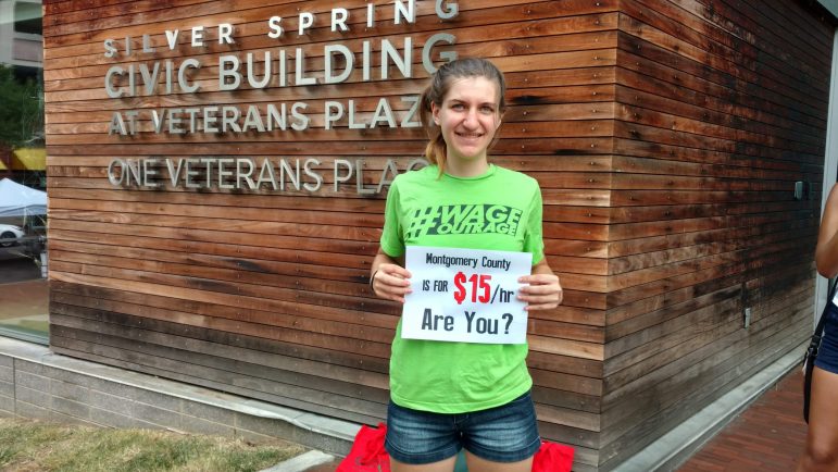 young woman poses with FF15 sign