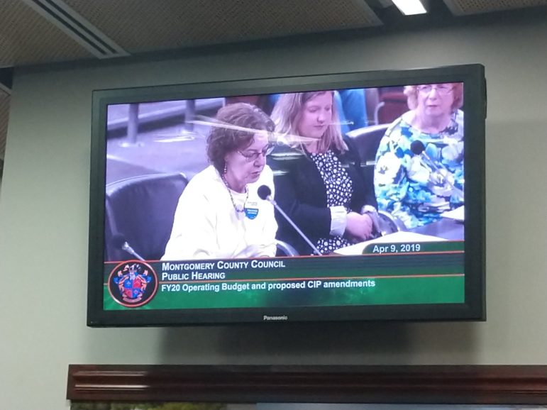 photo of a tv displaying moco county council public hearing