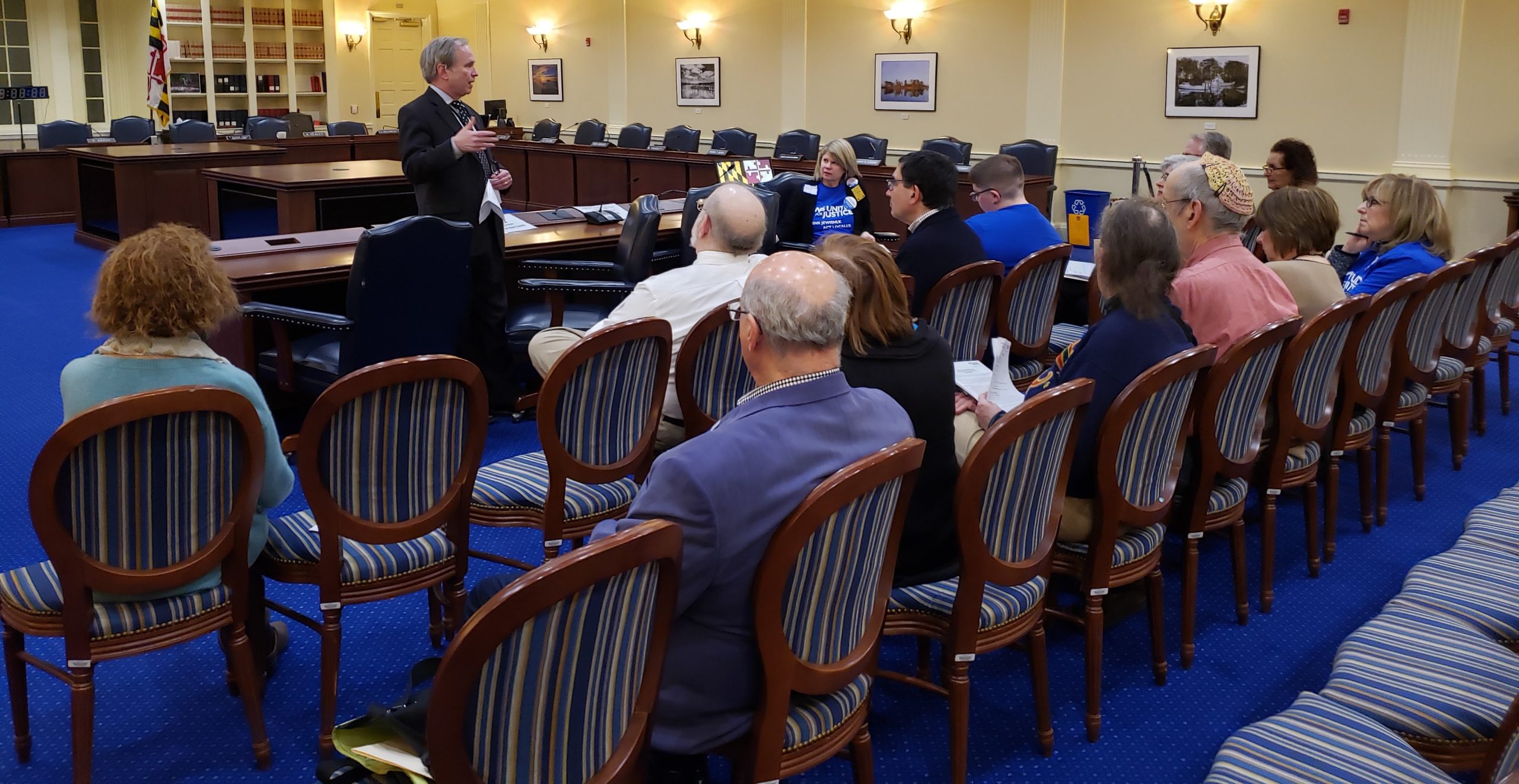 Delegate Dana Stein speaks to a room full of JUFJ members.