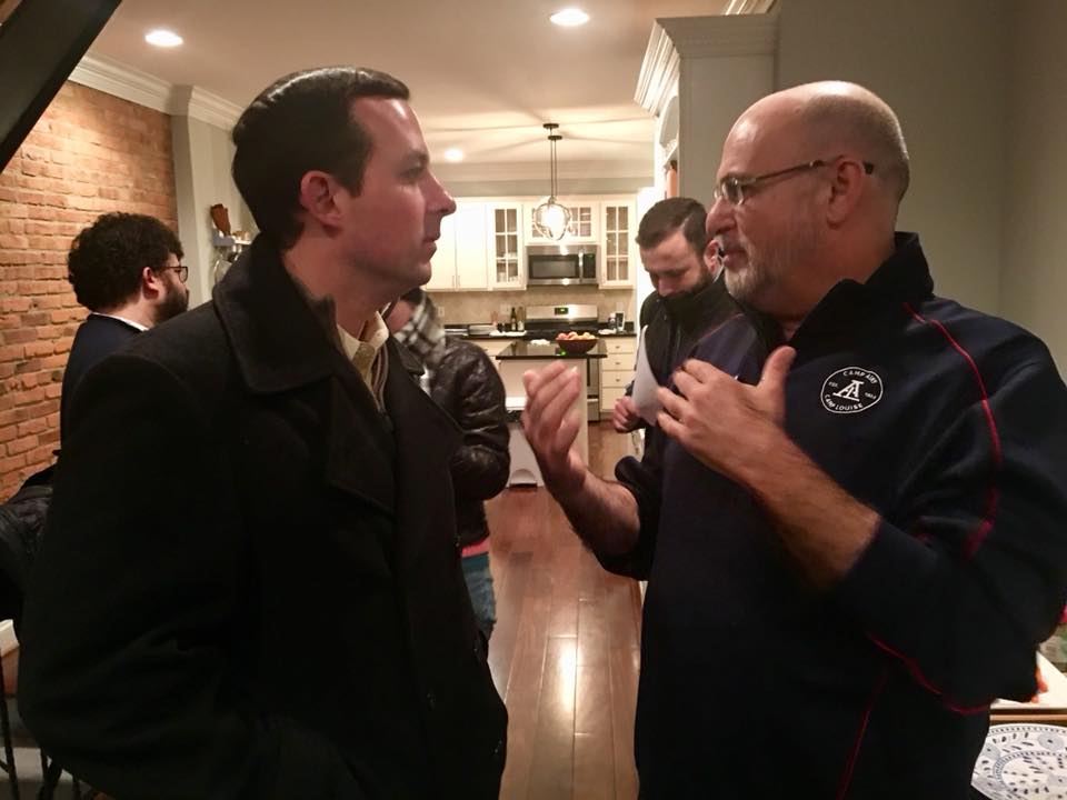 people chat before the district 46 legislator meeting