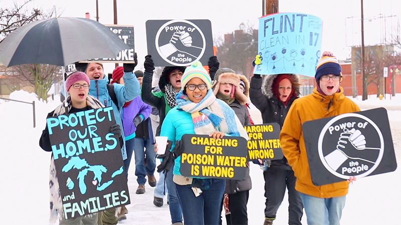 protesters marching for water justice