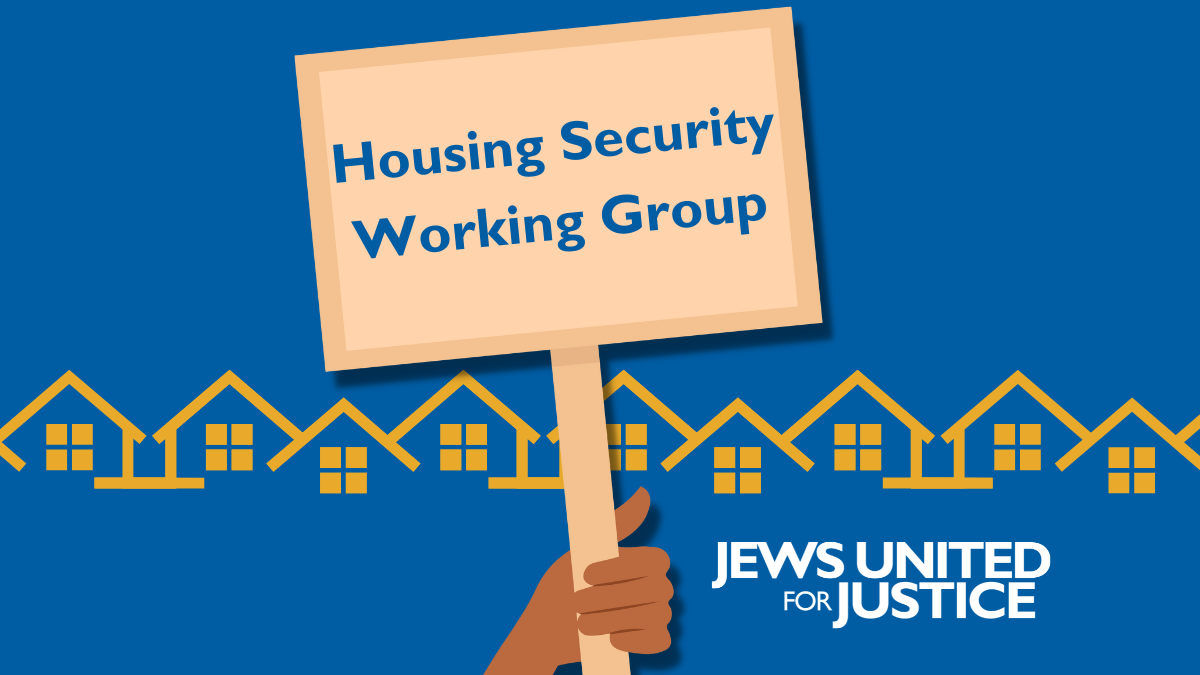 hand holding a sign reading: Housing Security Working Group